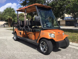 Orange Tomberlin 6 Passenger Golf Cart port charlotte golf cart repairs, golf cart service, mobile repair